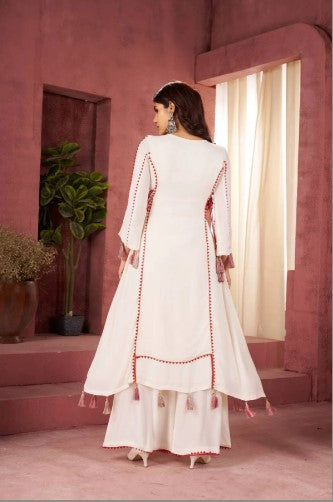 beautiful Designer Peplum & Bell Bottom Set On Reyon Febric With Thred & Real mirror work With Tassels and Lace work For Girls.